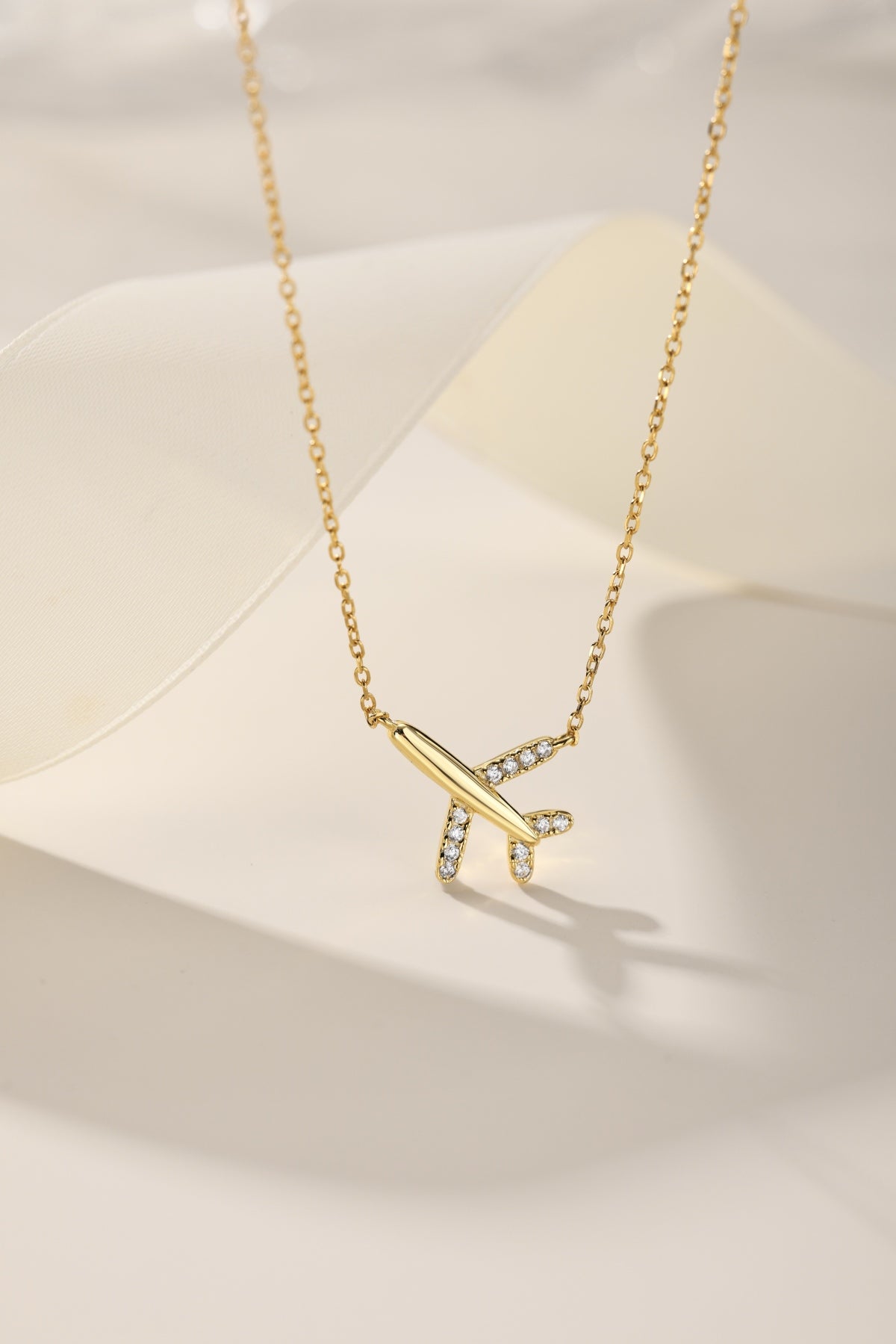 Golden Airplane Necklace